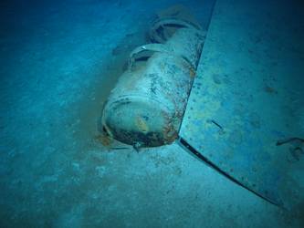 Steel plate and cylindrical tank on seabed. Top of B turret?